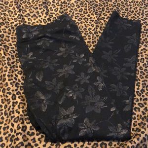 Black pull on pants with a floral print